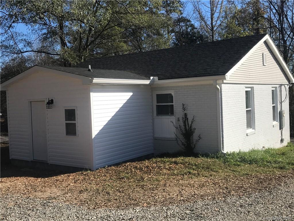 1507 Riley Street Albemarle, NC 28001 - Photo 6 of 26 a view of a house with a yard