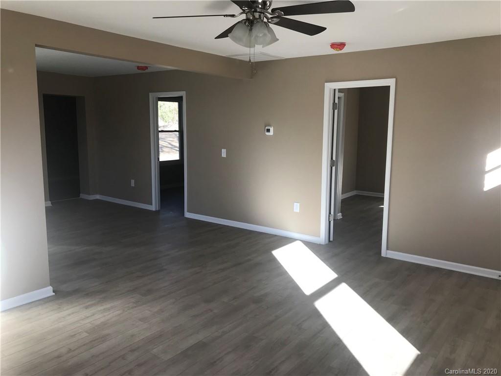 1507 Riley Street Albemarle, NC 28001 - Photo 8 of 26 wooden floor in a hall with an entryway