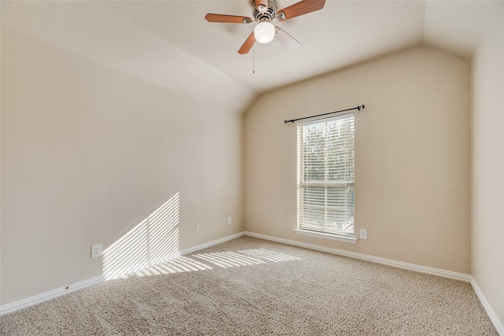 1010 Newington Circle Forney, TX 75126 - Photo 24 of 26 an empty room with closet and fan