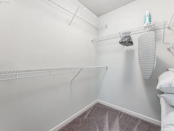 a bathroom with a double vanity sink and mirror