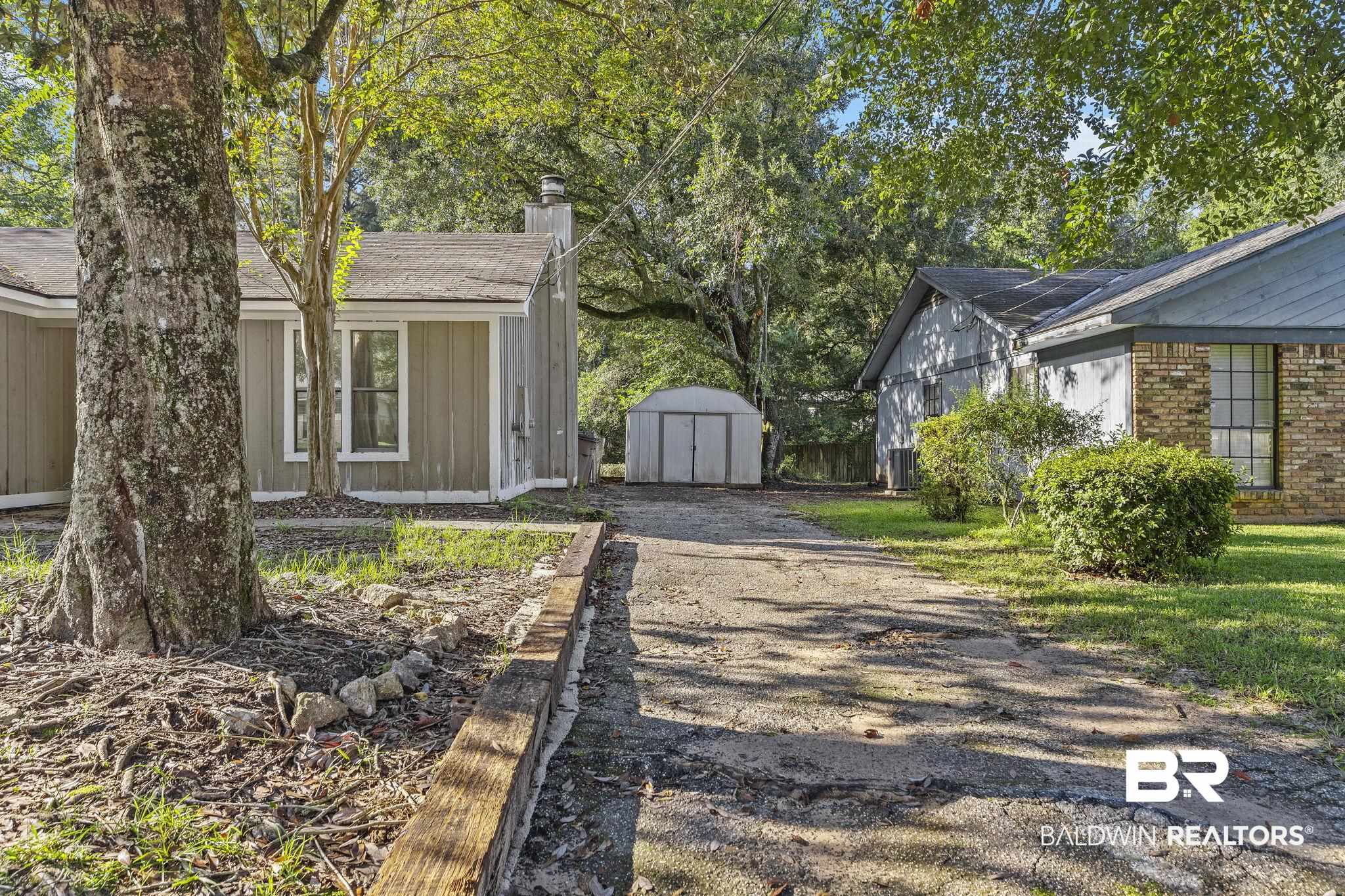 4151 Springdale Road Mobile, AL 36609 - Photo 3 of 21 View of front of house with a storage shed