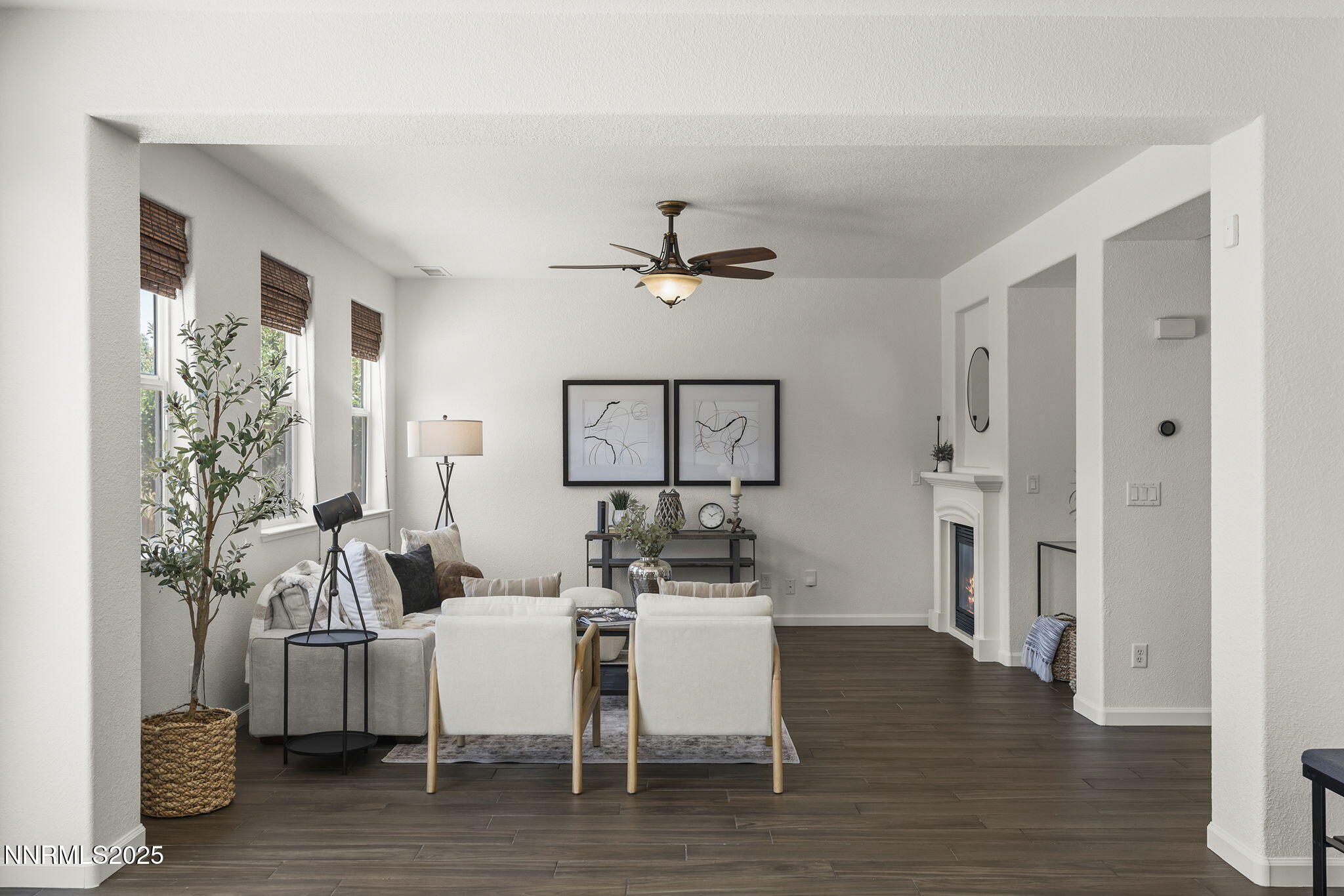 11135 Messina Way Reno, NV 89521 - Photo 12 of 31 a view of a dining room with furniture and wooden floor