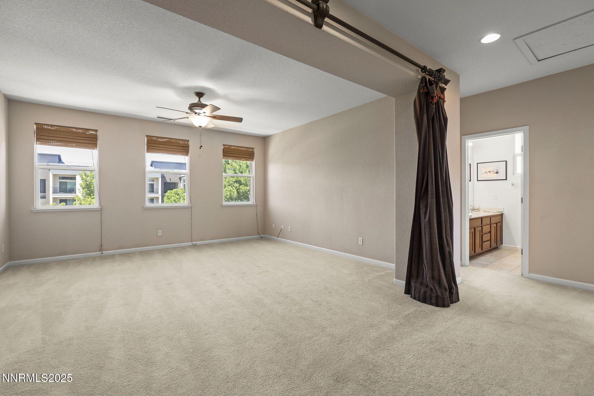 11135 Messina Way Reno, NV 89521 - Photo 17 of 31 an empty room with windows