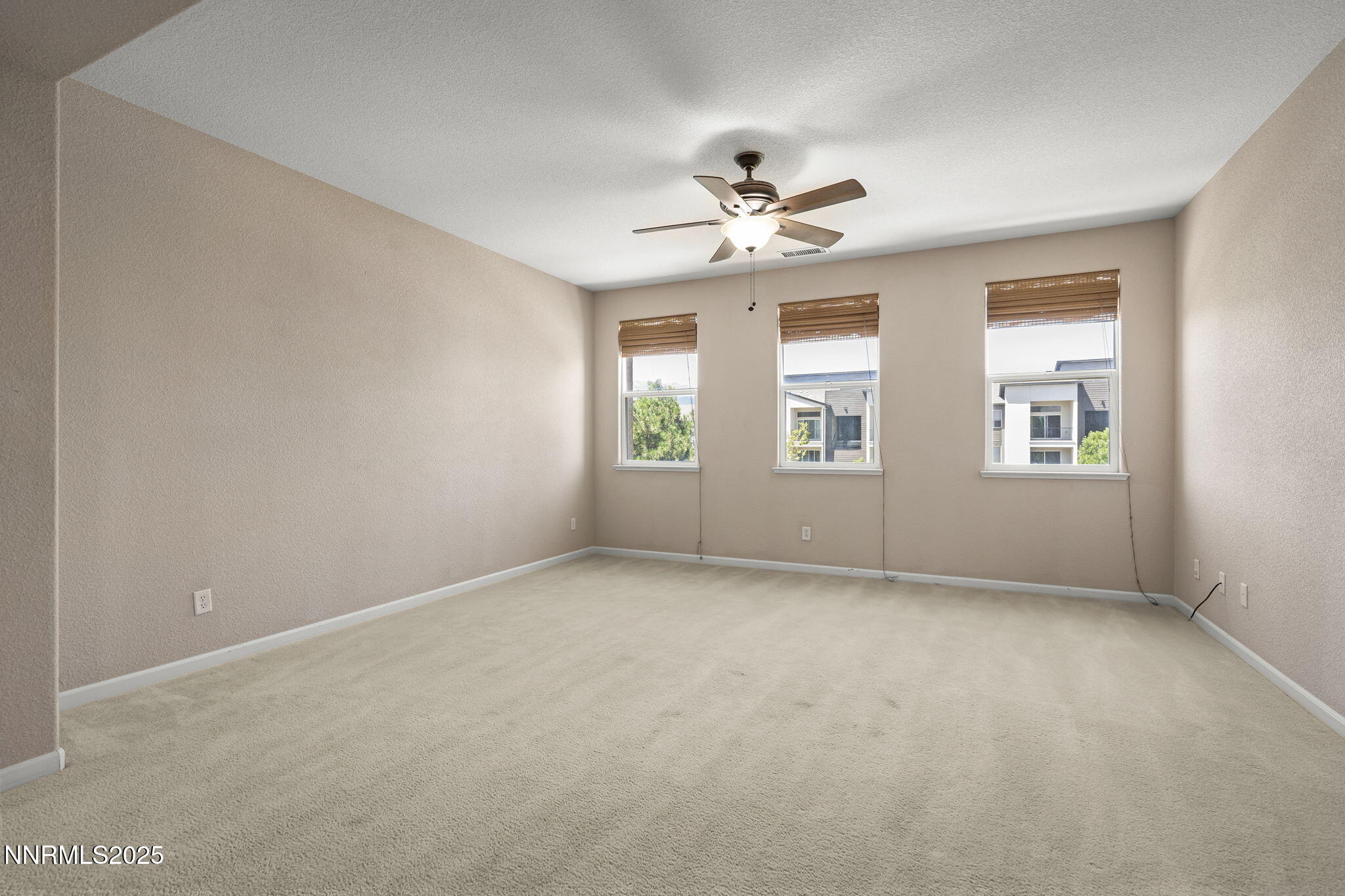 11135 Messina Way Reno, NV 89521 - Photo 18 of 31 a view of an empty room with a window