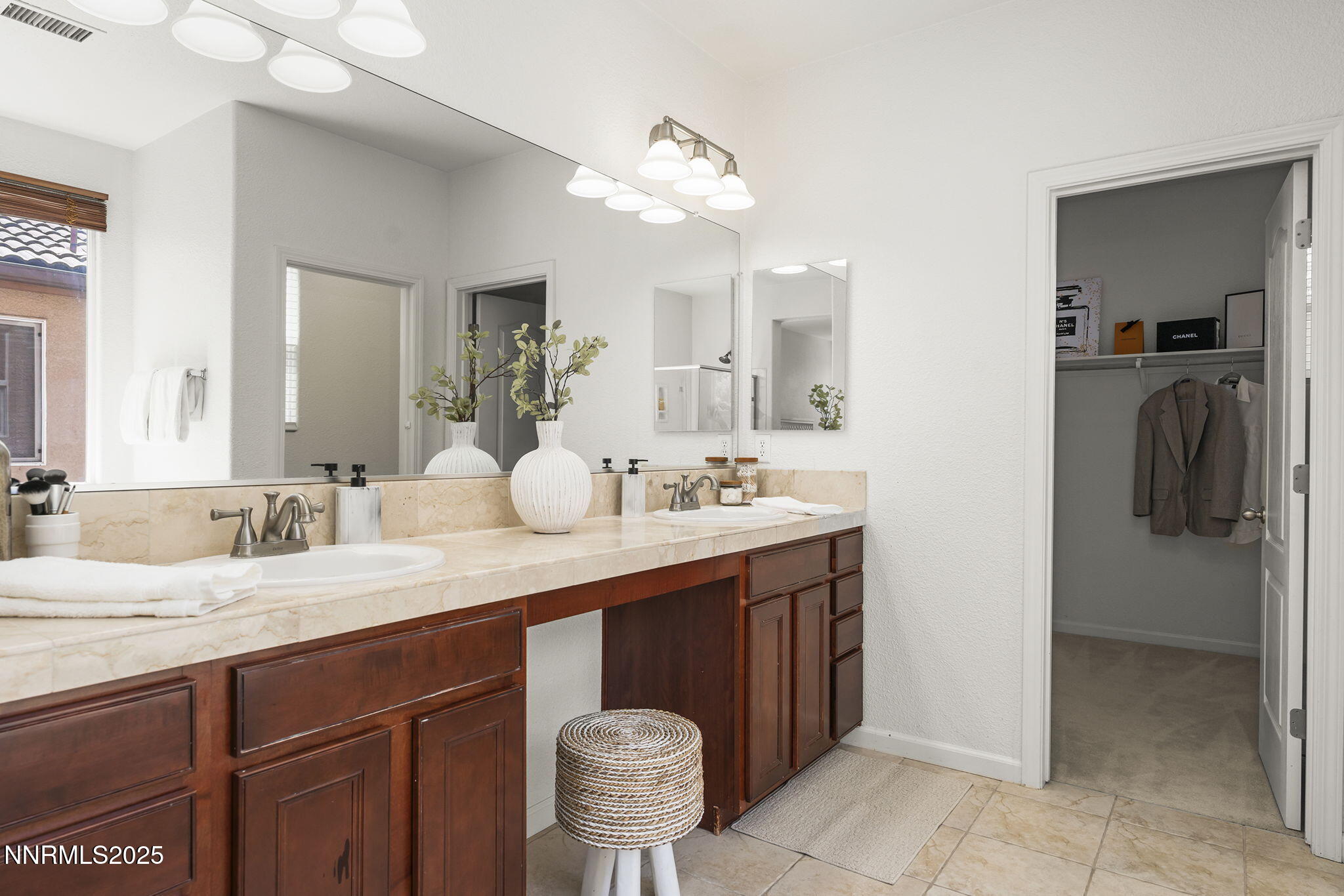 11135 Messina Way Reno, NV 89521 - Photo 22 of 31 a bathroom with a sink and a mirror