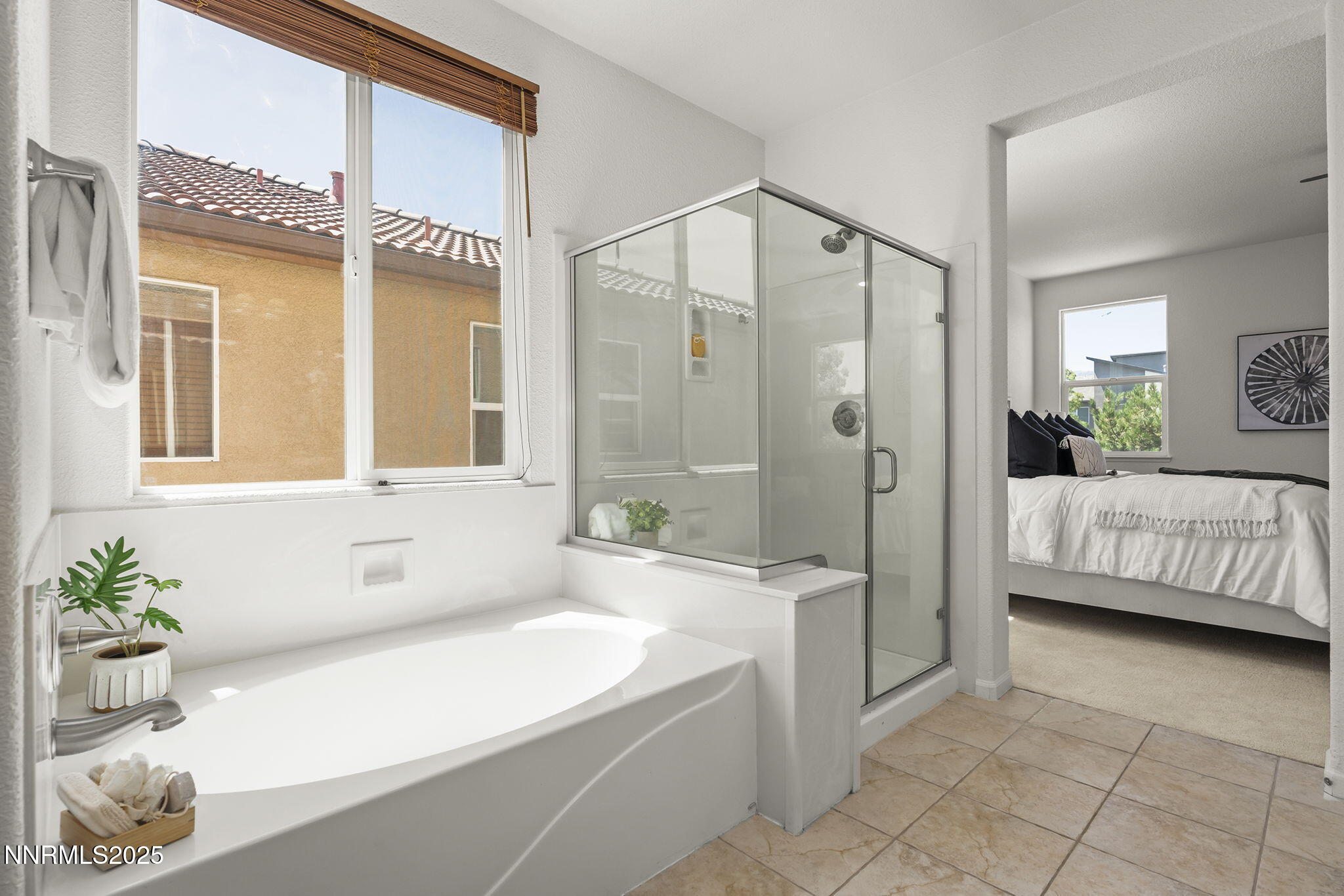 11135 Messina Way Reno, NV 89521 - Photo 23 of 31 a spacious bathroom with a tub shower and sink
