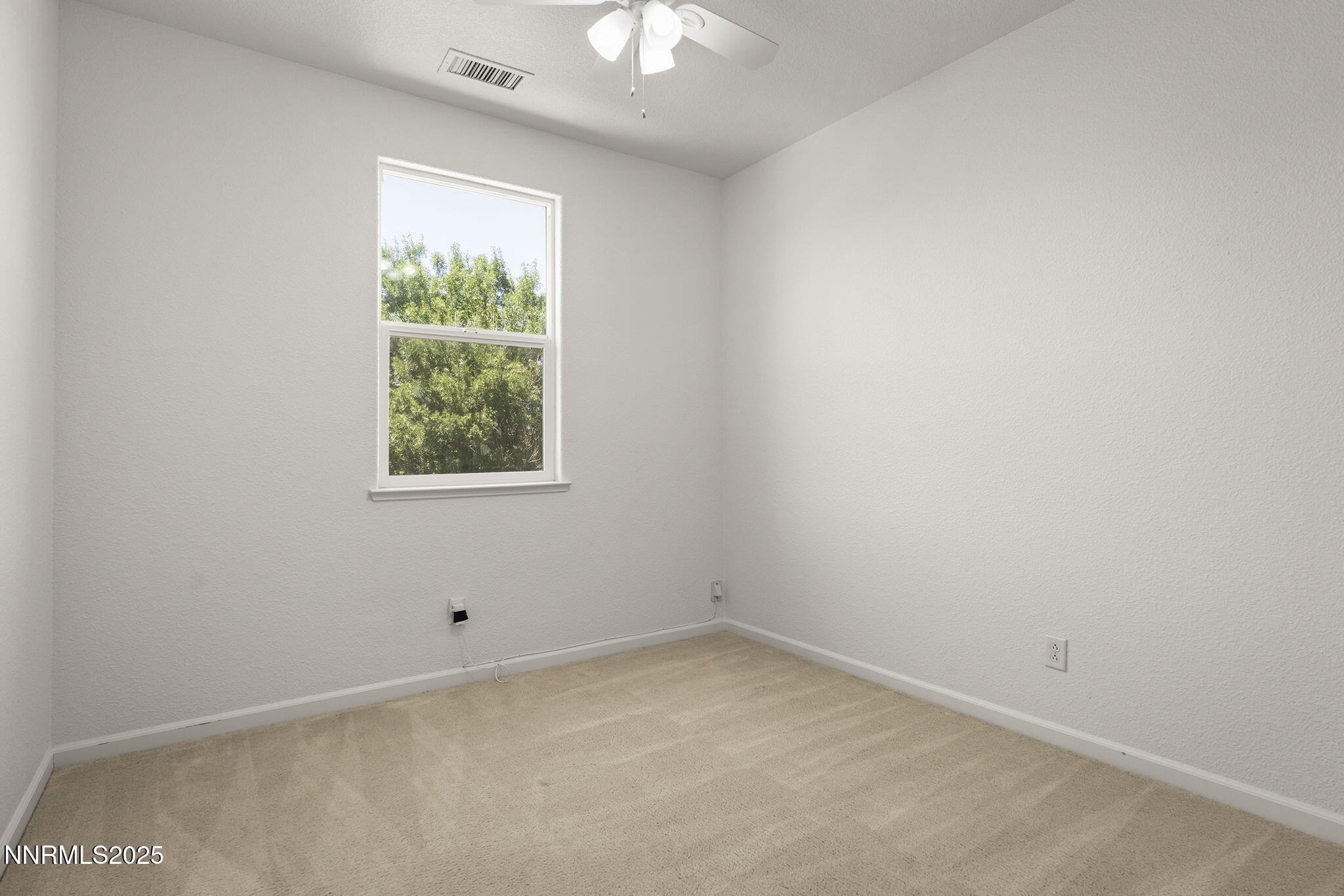 11135 Messina Way Reno, NV 89521 - Photo 24 of 31 an empty room with a window