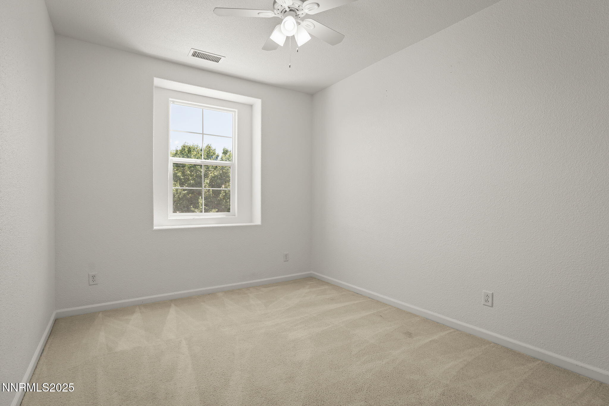 11135 Messina Way Reno, NV 89521 - Photo 25 of 31 an empty room with a window