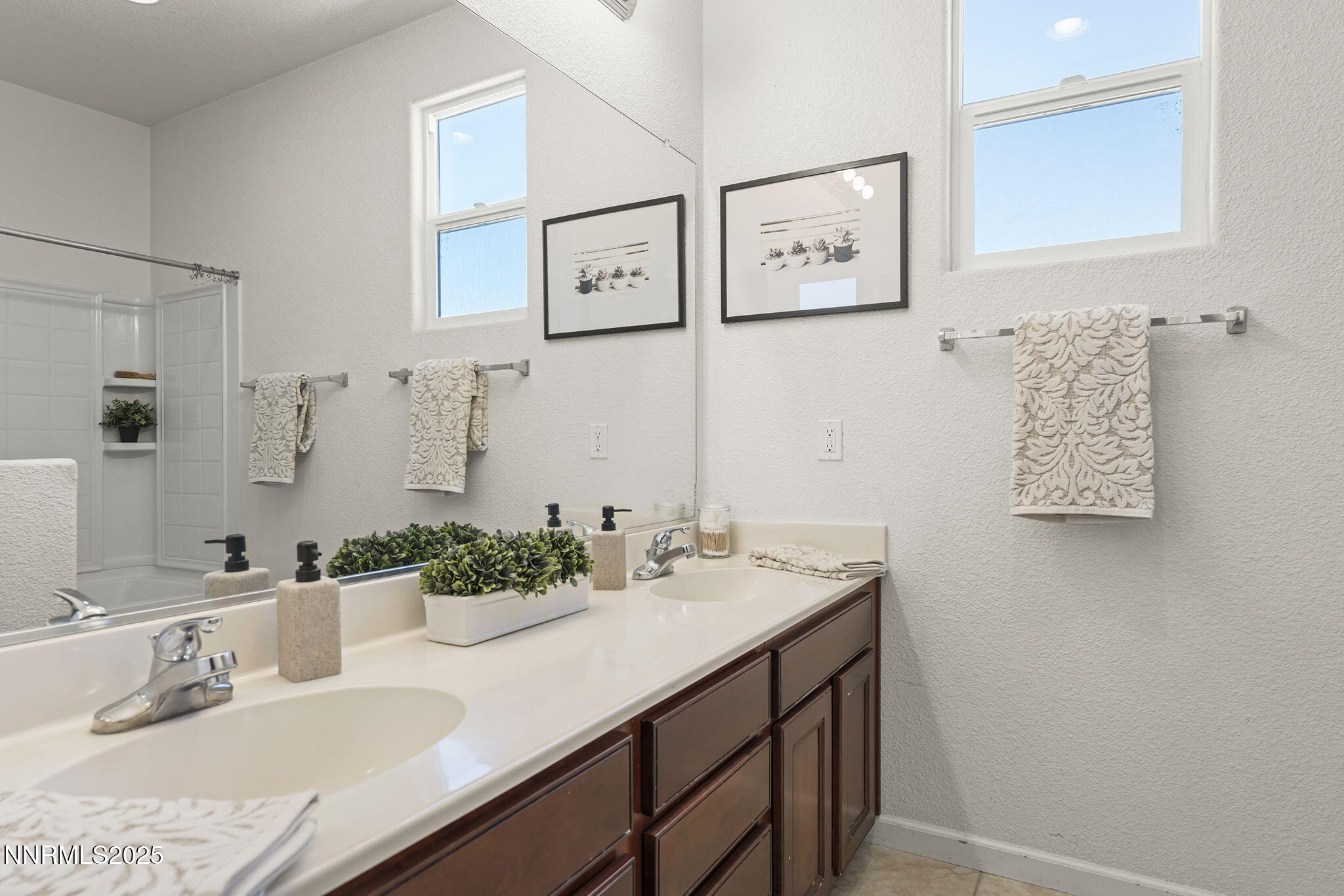 11135 Messina Way Reno, NV 89521 - Photo 27 of 31 a bathroom with a sink and a mirror