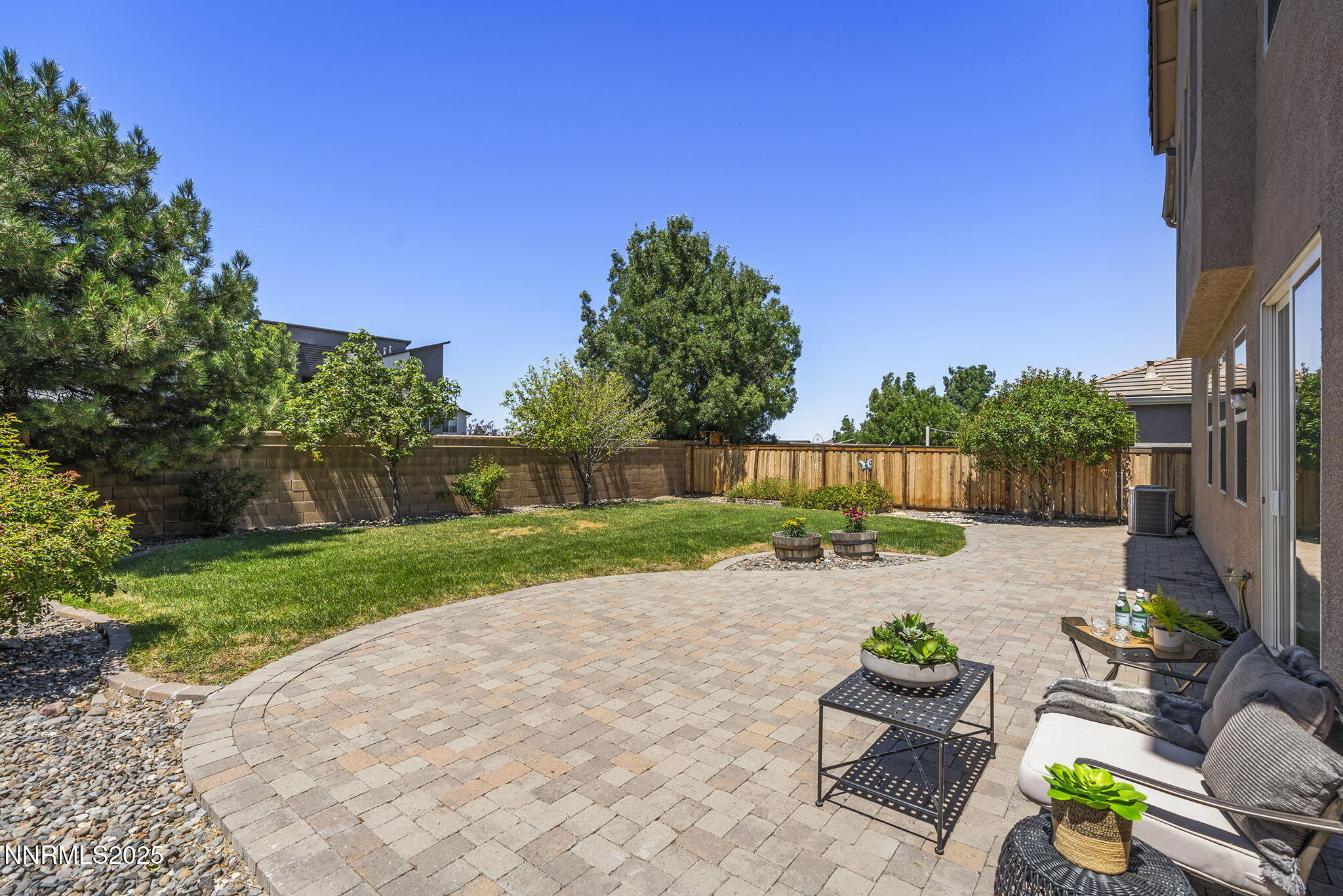 11135 Messina Way Reno, NV 89521 - Photo 29 of 31 a view of backyard with outdoor seating and green space