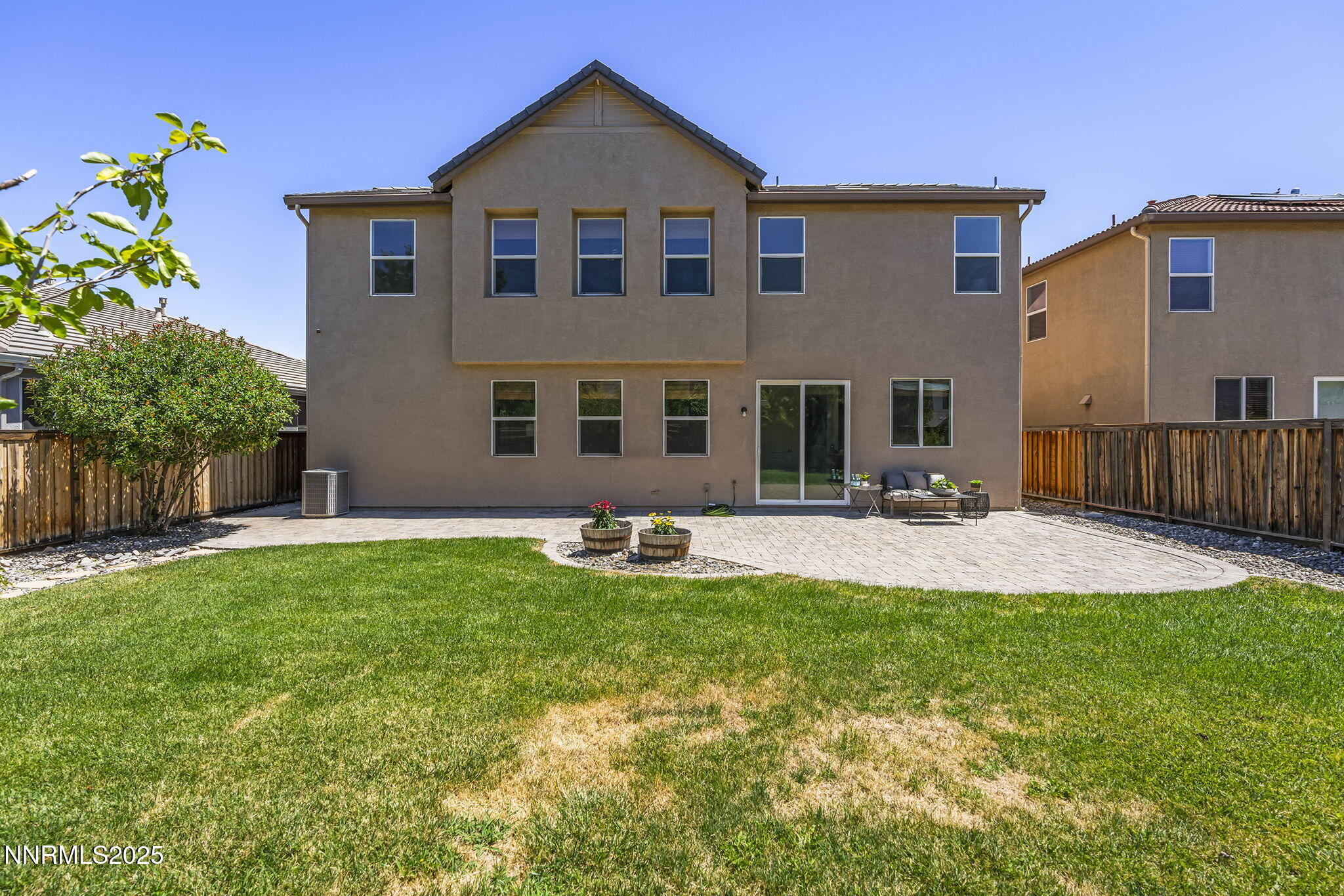 11135 Messina Way Reno, NV 89521 - Photo 30 of 31 a front view of a house with a yard