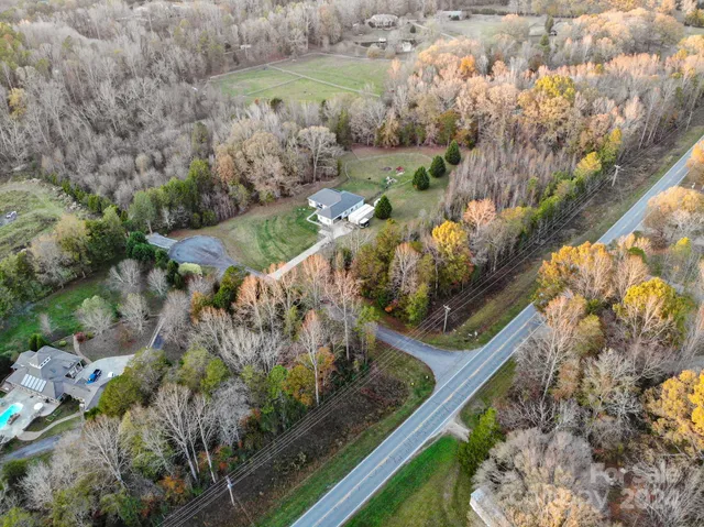 a view of swimming pool from a balcony