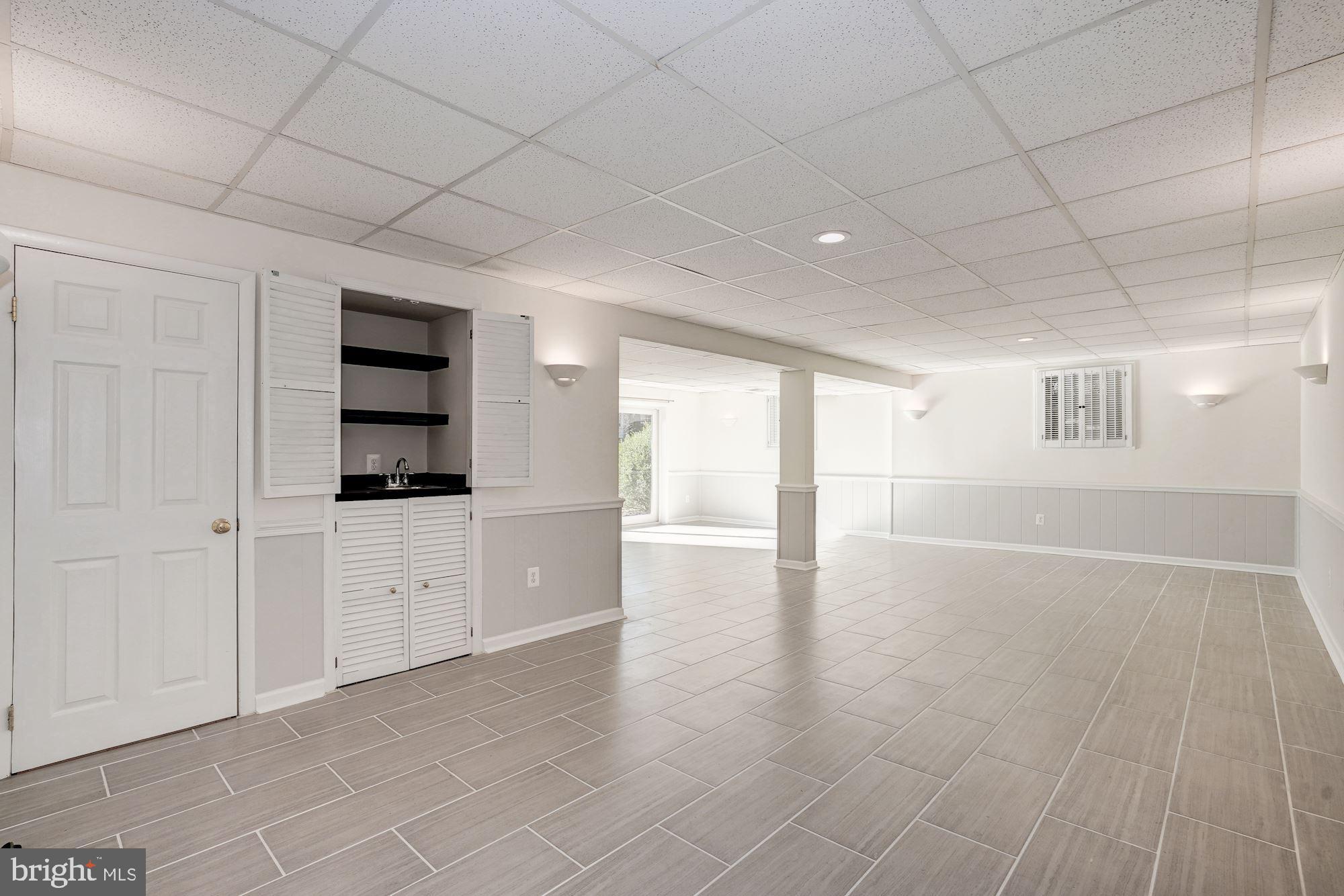 7915 Foxhound Road McLean, VA 22102 - Photo 15 of 19 Expansive Lower Level Recreation Room
