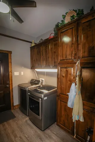 a kitchen with granite countertop a stove and a refrigerator