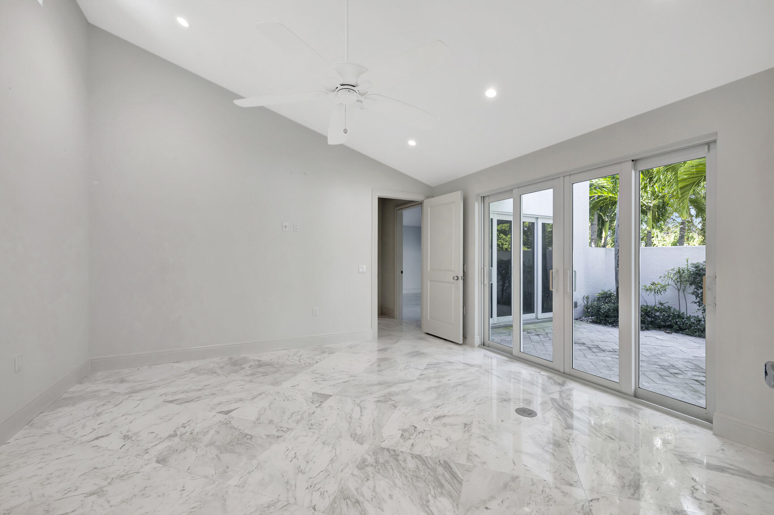 355 Oakview Drive Delray Beach, FL 33445 - Photo 51 of 92 a view of an empty room with glass door