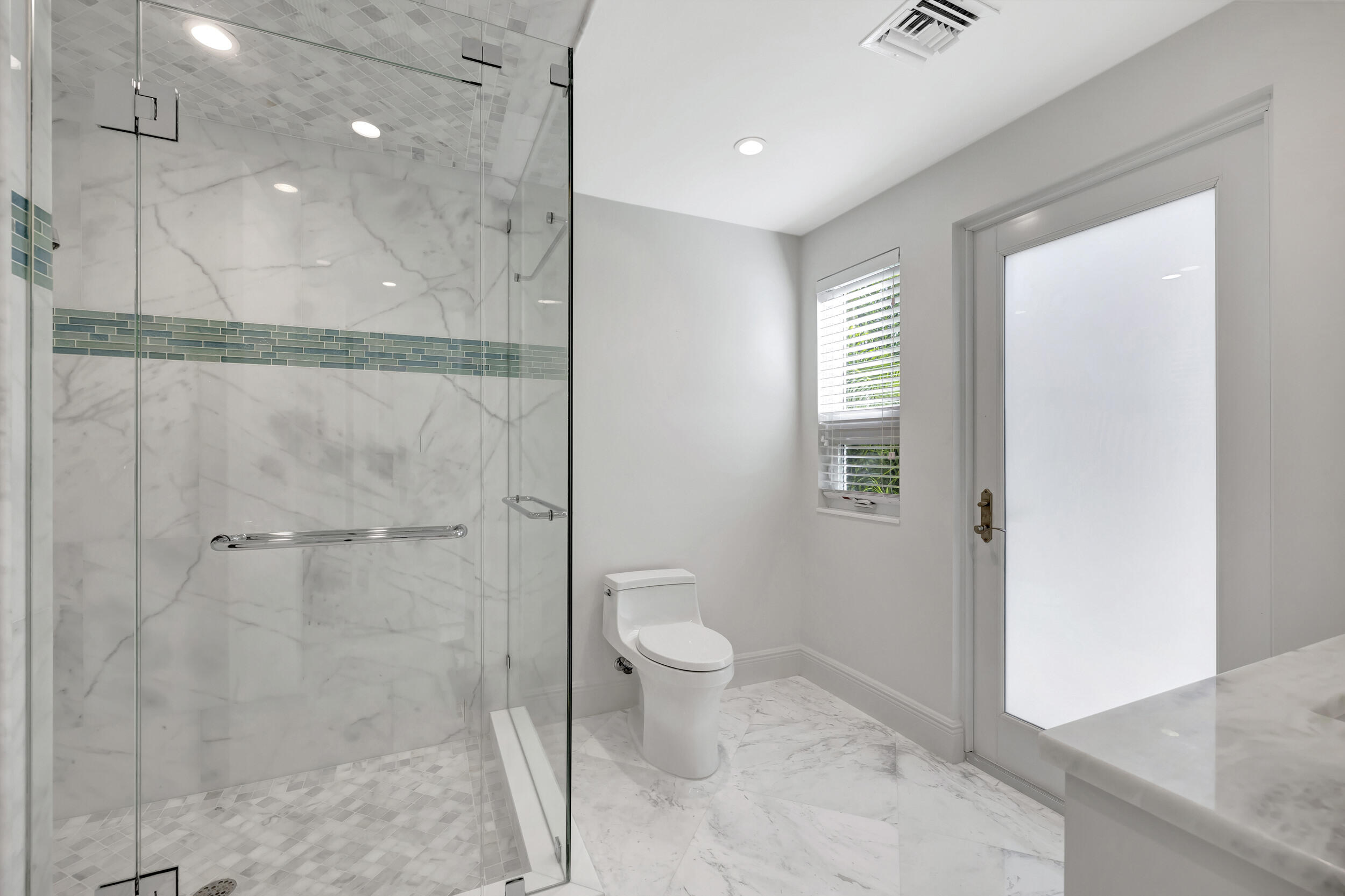 355 Oakview Drive Delray Beach, FL 33445 - Photo 63 of 92 a bathroom with a granite countertop sink a toilet and shower