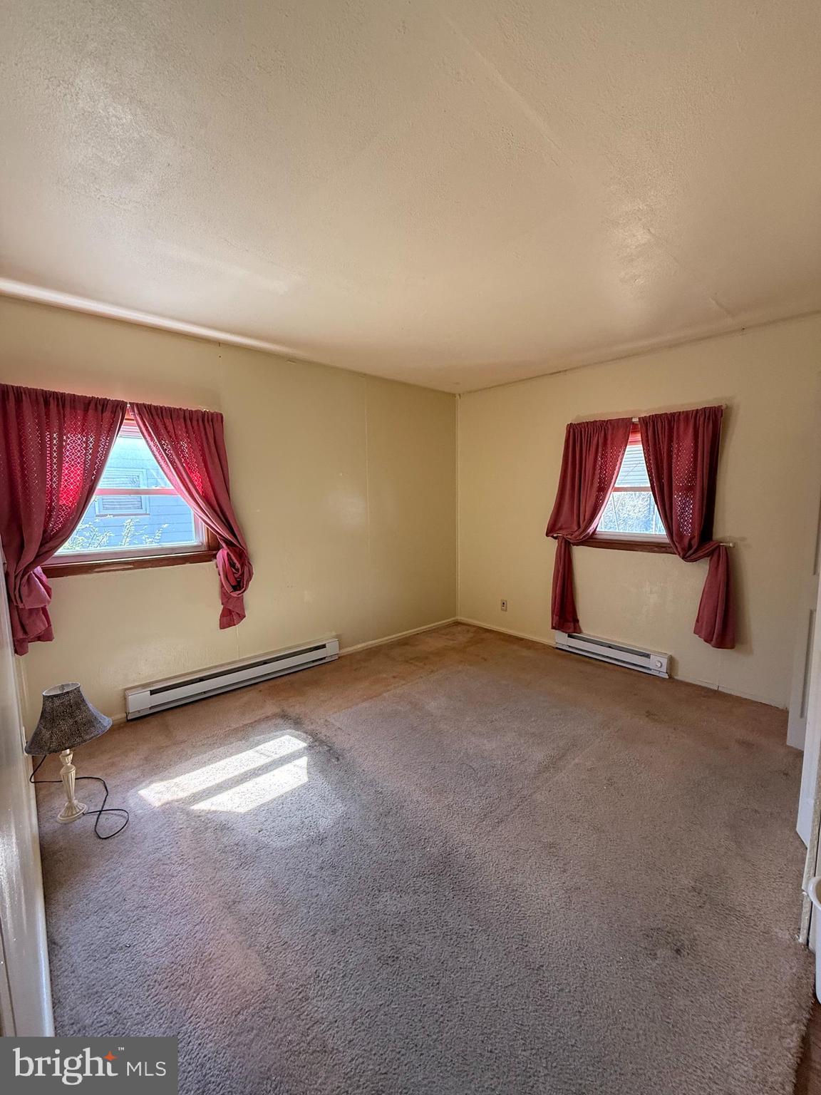 419 Iowa Avenue Delanco, NJ 08075 - Photo 6 of 14 a view of empty room with wooden floor and fan