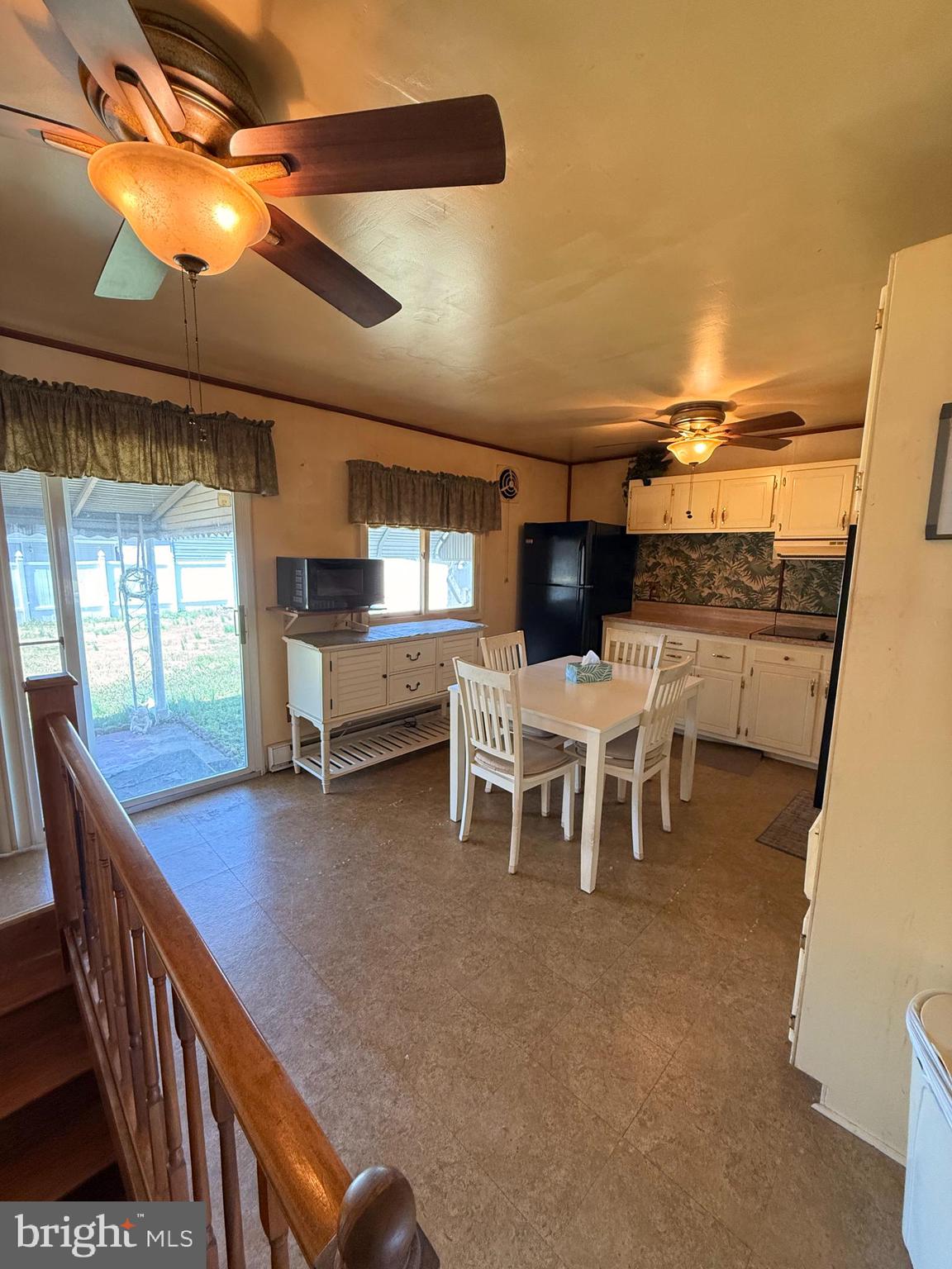 419 Iowa Avenue Delanco, NJ 08075 - Photo 10 of 14 a group of chairs sitting in patio with kitchen view