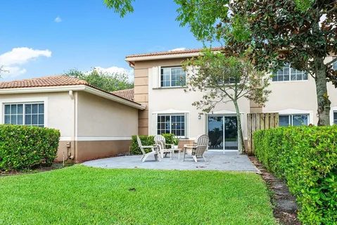 a house view with a garden space