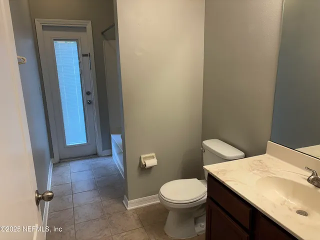 a bathroom with a sink and a toilet