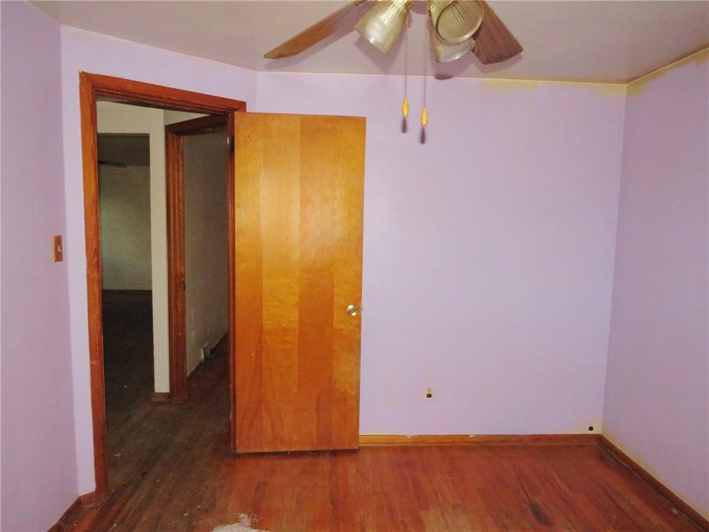 214 Erwin Place McKees Rocks, PA 15136 - Photo 11 of 25 wooden floor in an empty room