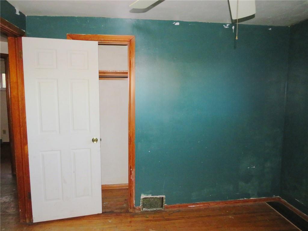 214 Erwin Place McKees Rocks, PA 15136 - Photo 14 of 25 a view of a room with wooden floor