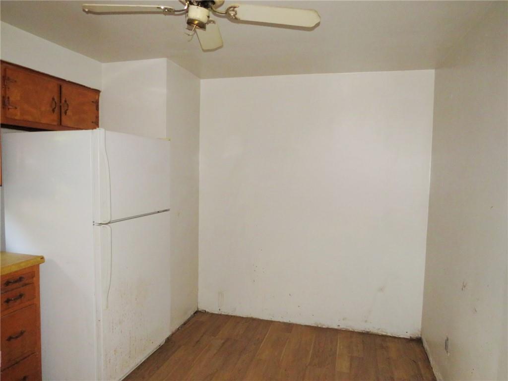 214 Erwin Place McKees Rocks, PA 15136 - Photo 21 of 25 a view of a room with wooden floor