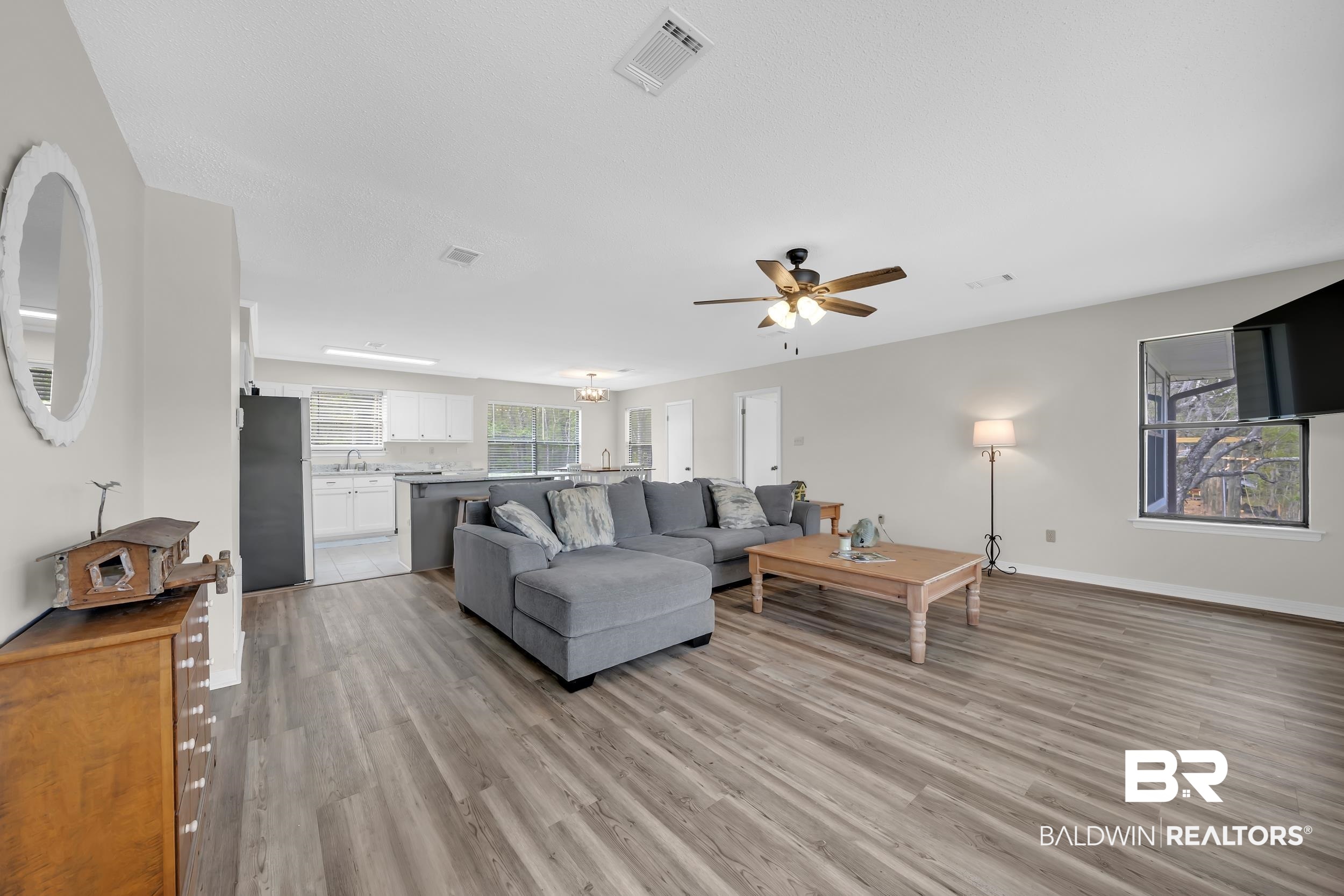 8081 Bryant's Lndg Road Stockton, AL 36579 - Photo 20 of 48 Living room featuring light wood-style floors and ceiling fan