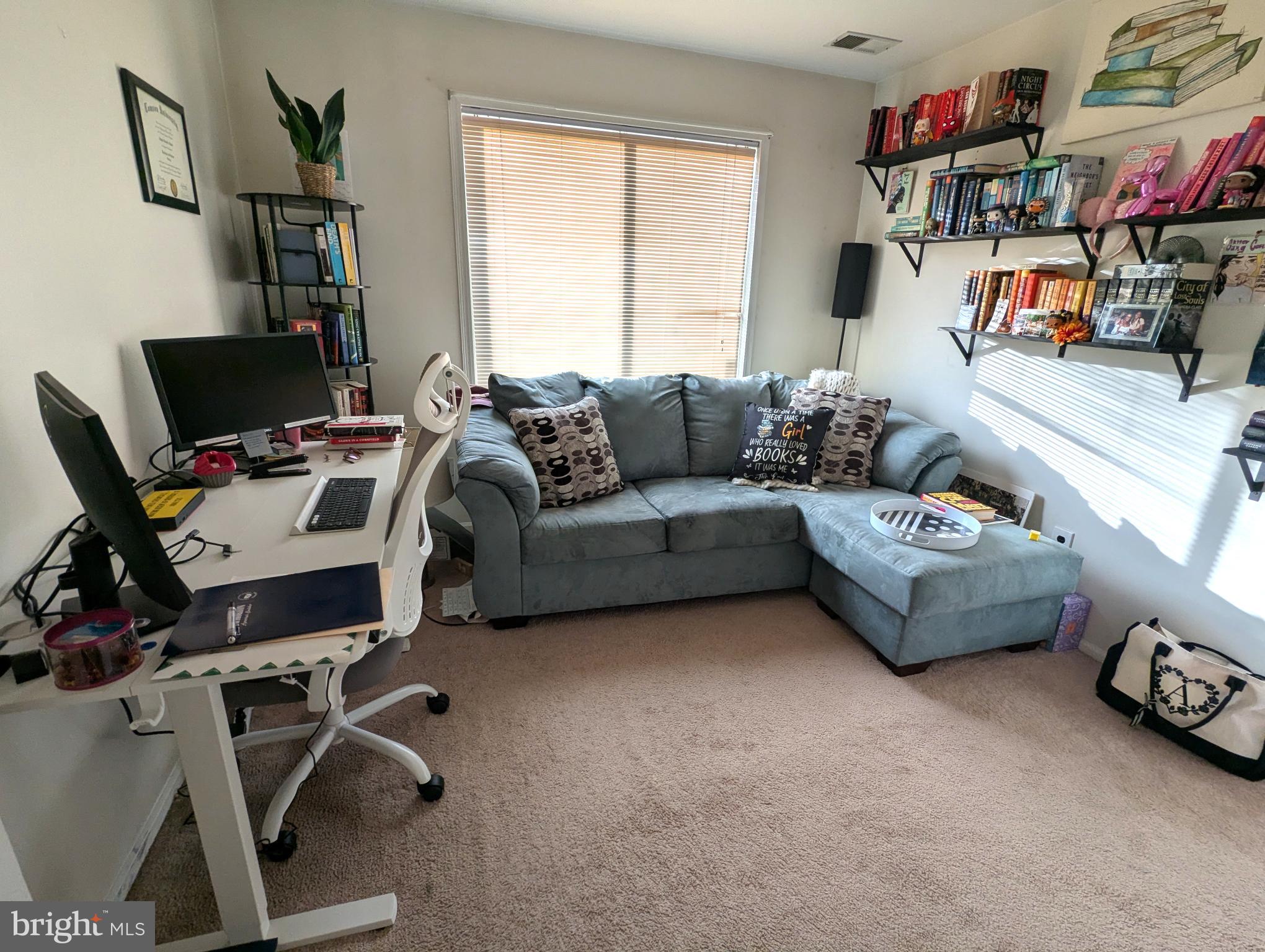 409 Silvia Street Ewing, NJ 08628 - Photo 14 of 16 a living room with furniture and a window