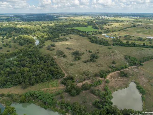 a view of an ocean and a mountain