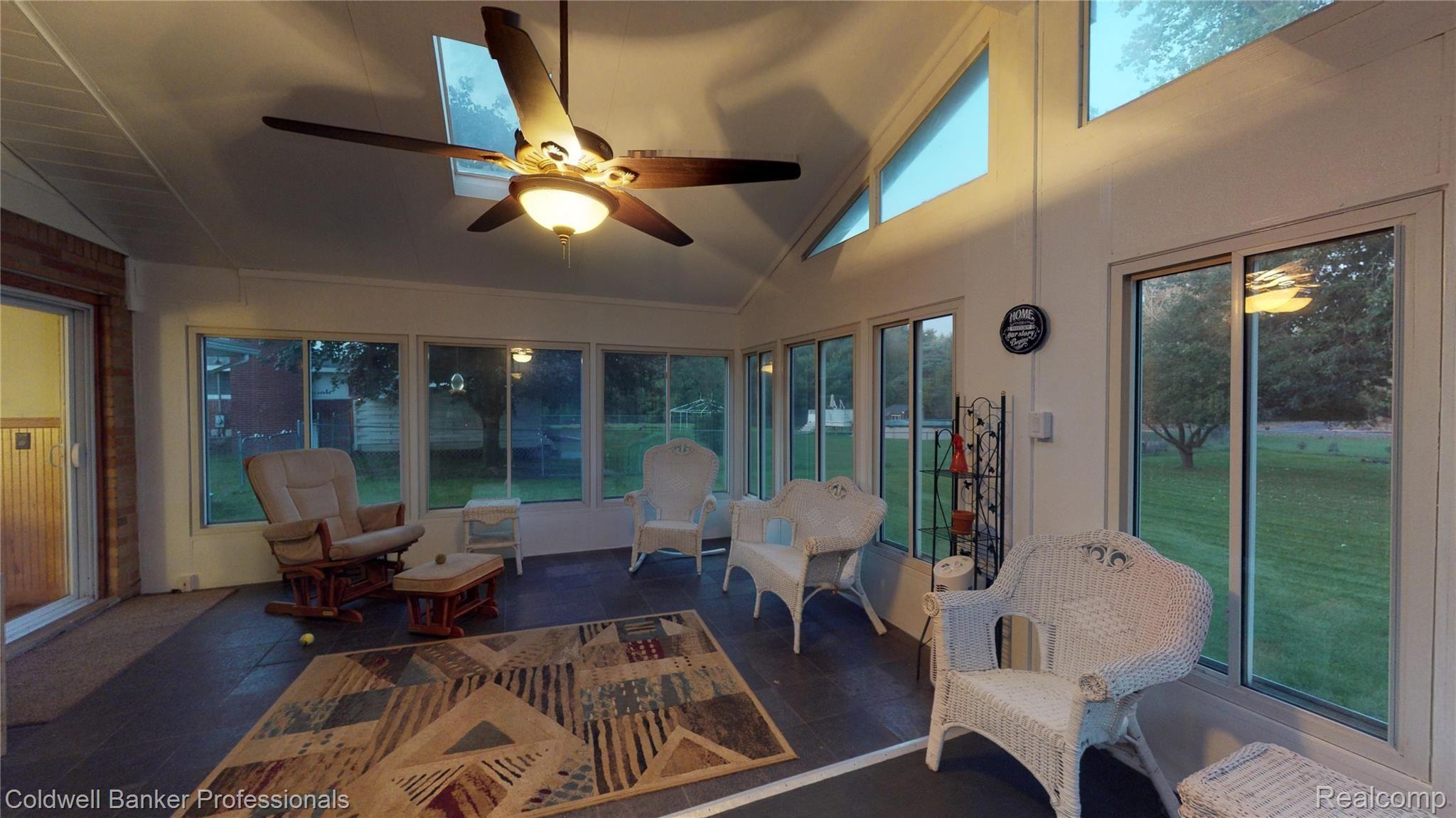 260 North Tipsico Lake Road Highland, MI 48357 - Photo 23 of 33 Florida Room from pool entry.jpg