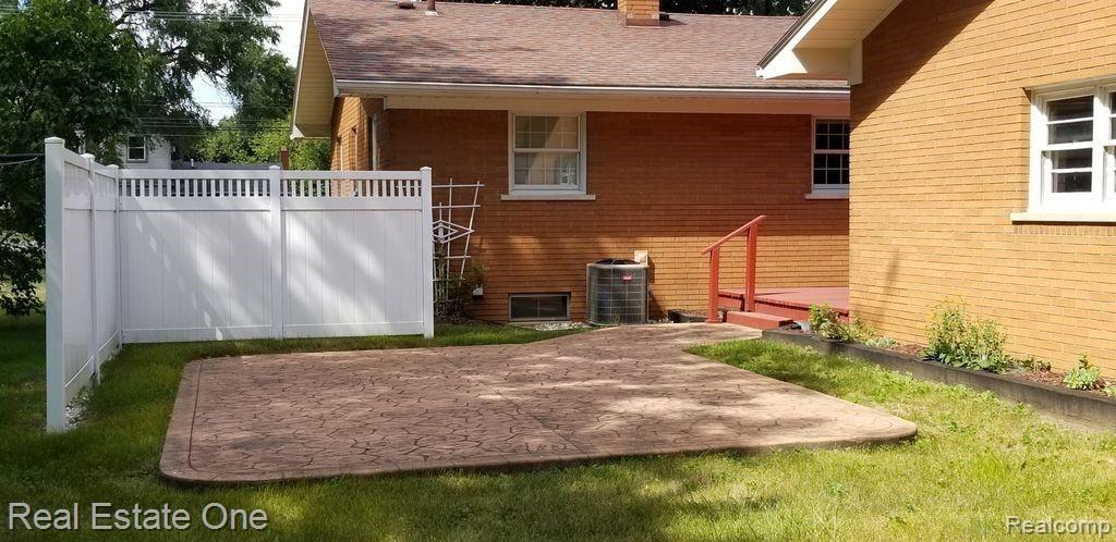 405 West Square Lake Road Troy, MI 48098 - Photo 3 of 24 405 W Sq Lk Rear patio.jpg