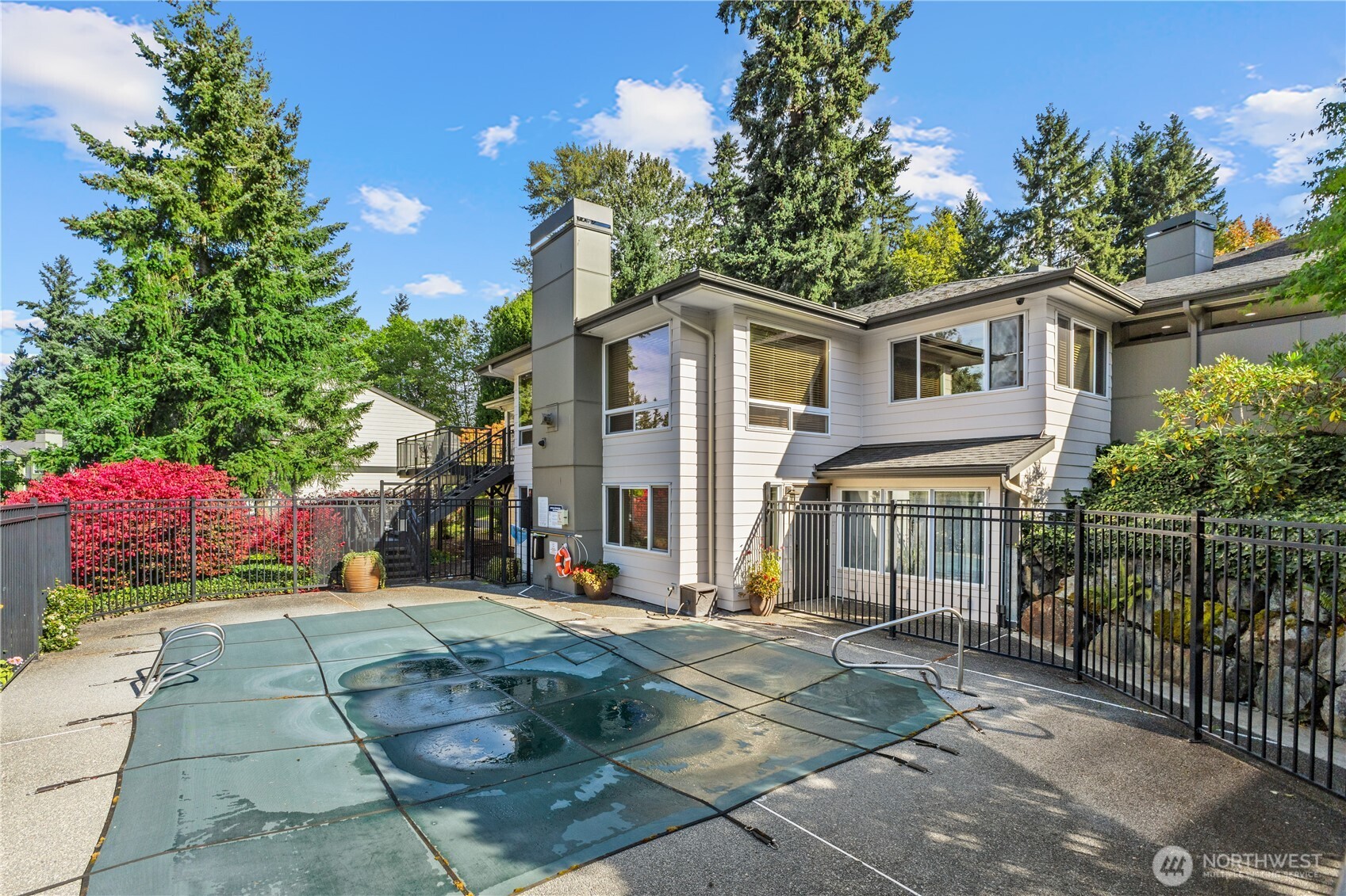 31500 33rd Place Southwest, Unit N103 Federal Way, WA 98023 - Photo 18 of 25 a front view of a house with a garden