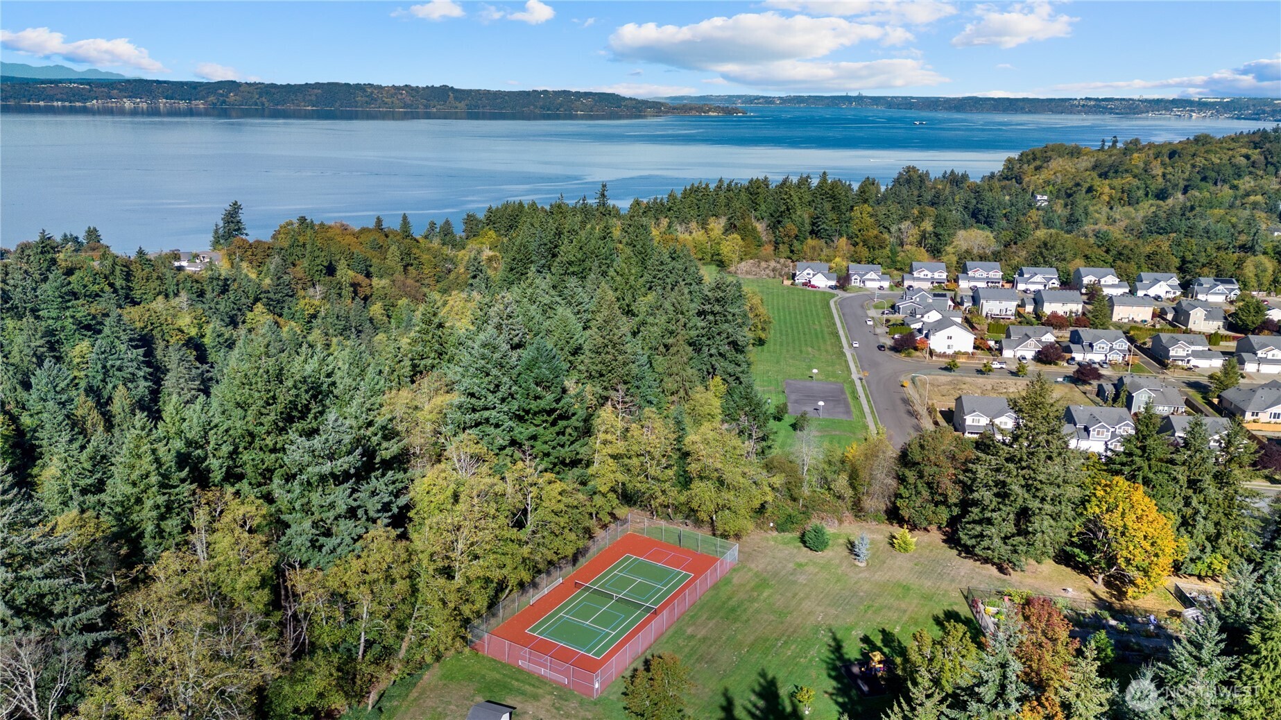 31500 33rd Place Southwest, Unit N103 Federal Way, WA 98023 - Photo 23 of 25 a view of a lake from a balcony