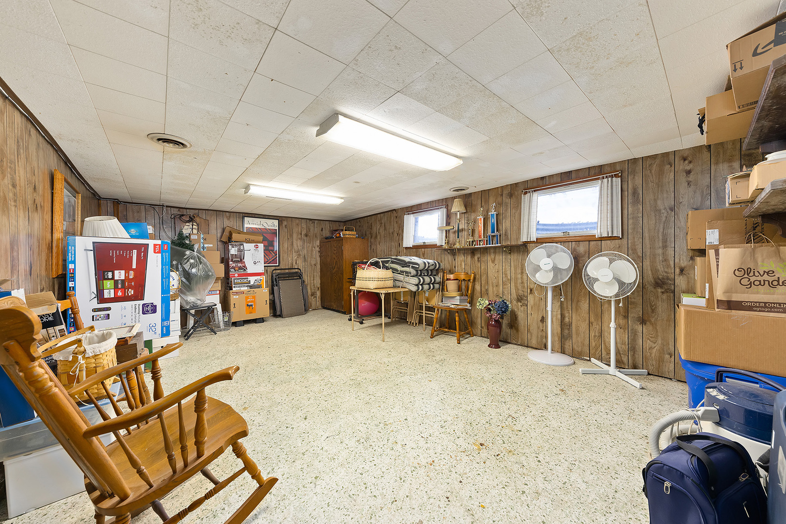110 West 12th Avenue Naperville, IL 60563 - Photo 16 of 20 a view of a livingroom with furniture and a fan