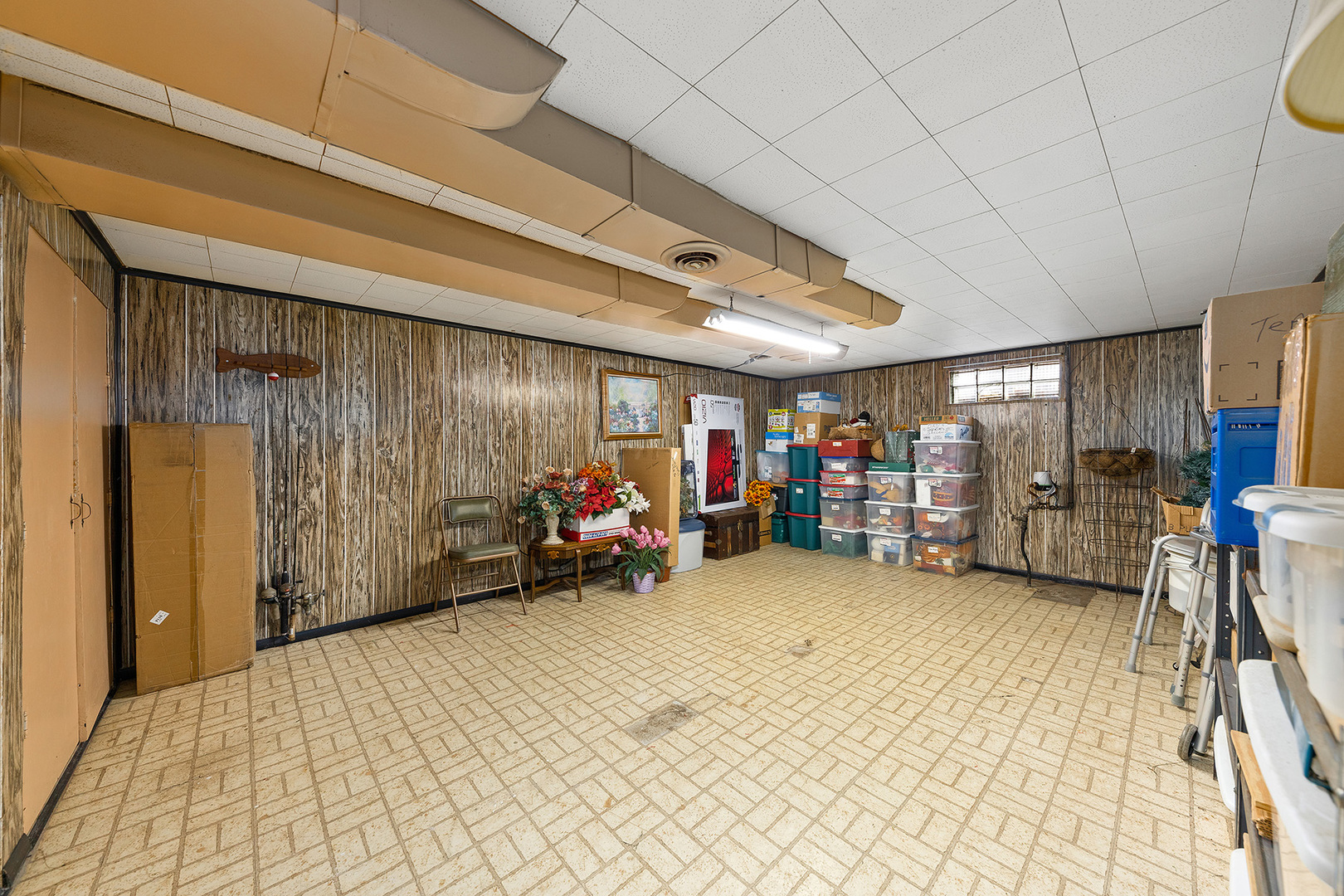 110 West 12th Avenue Naperville, IL 60563 - Photo 17 of 20 a view of a garage with furniture