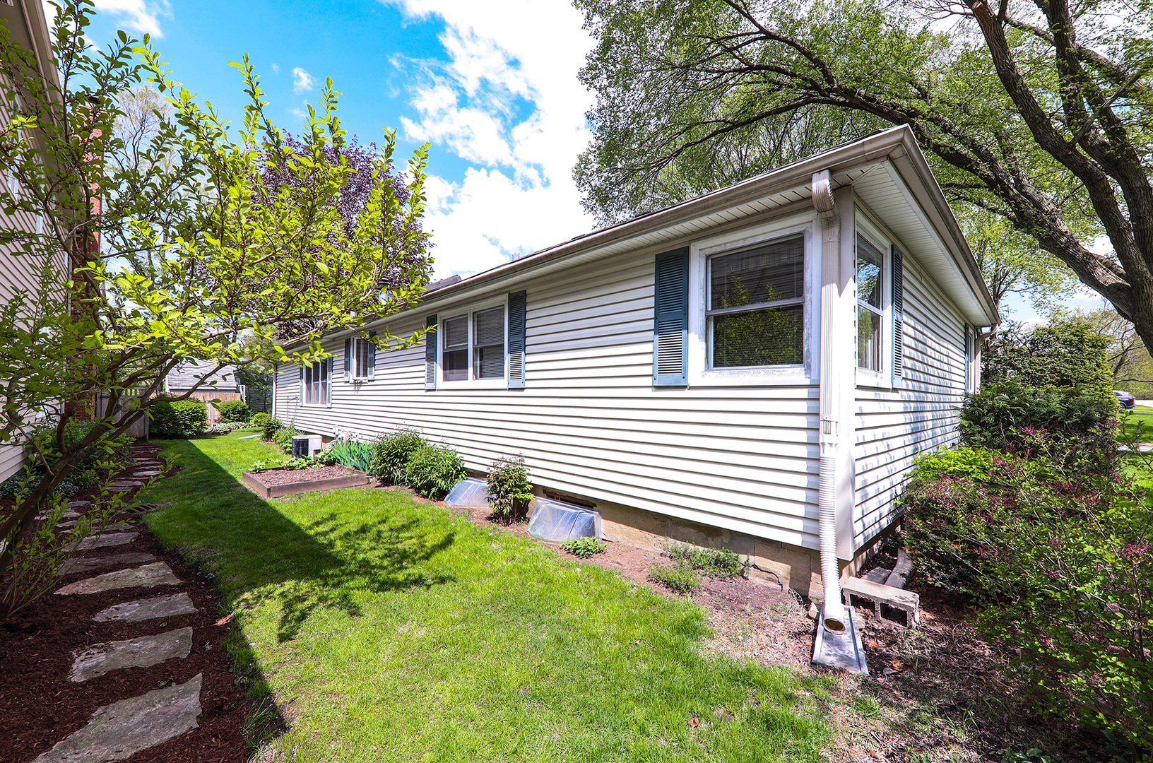 110 West 12th Avenue Naperville, IL 60563 - Photo 20 of 20 a front view of a house with garden