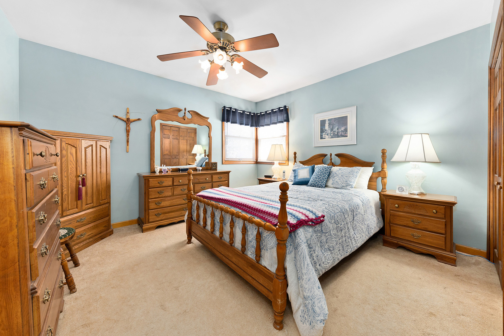 110 West 12th Avenue Naperville, IL 60563 - Photo 10 of 20 a bedroom with a bed dresser and a window