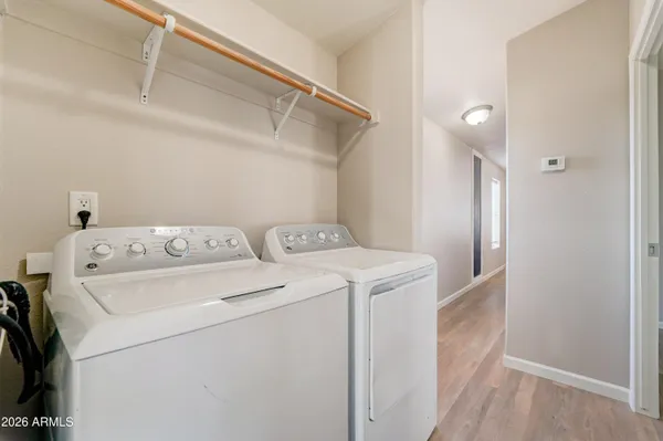 a utility room with dryer and washer