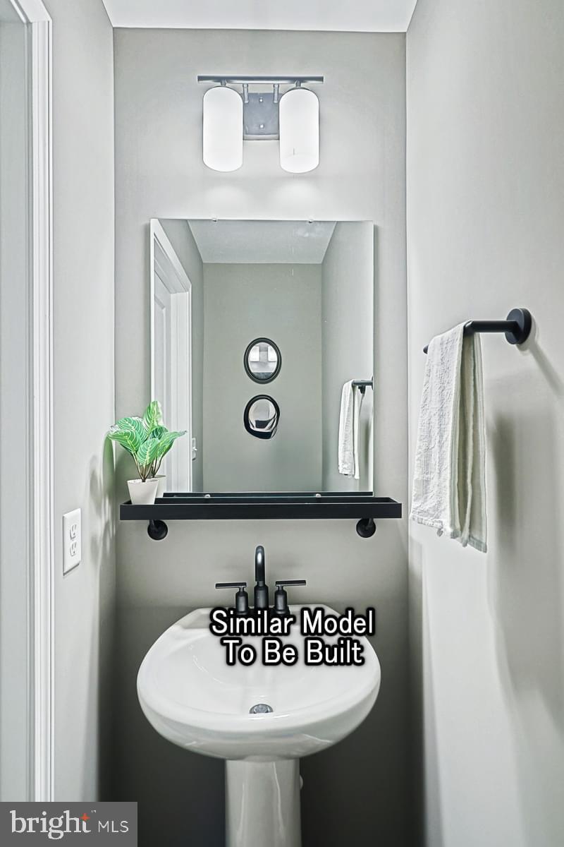 118 Redbud Road Bellefonte, PA 16823 - Photo 10 of 19 a bathroom with a sink and a mirror