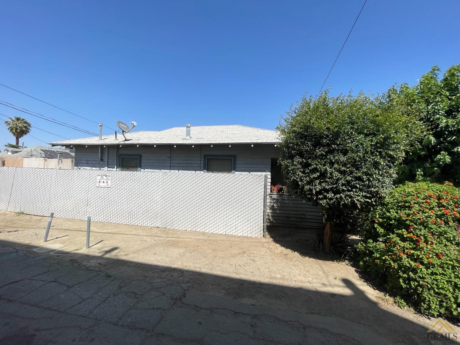 Undisclosed Address Bakersfield, CA 93304 - Photo 14 of 21 a view of a back yard of the house
