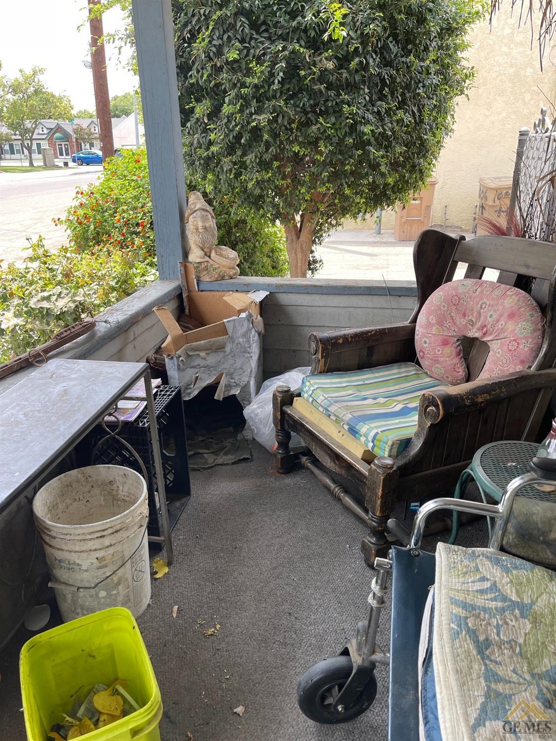 Undisclosed Address Bakersfield, CA 93304 - Photo 19 of 21 a living room with furniture and a floor to ceiling window