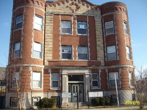 5203 South Calumet Avenue, Unit 3D Chicago, IL 60615 - Photo 1 of 8 a front view of a multi story residential apartment building