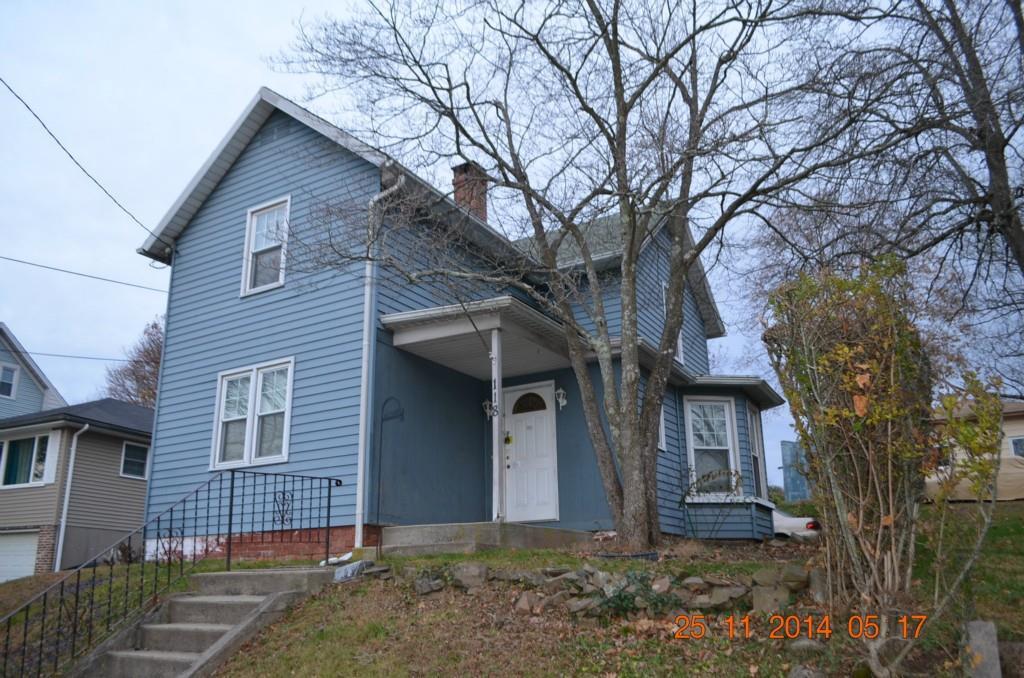 118 View Street Meriden, CT 06450 - Photo 1 of 1 a front view of a house with a yard