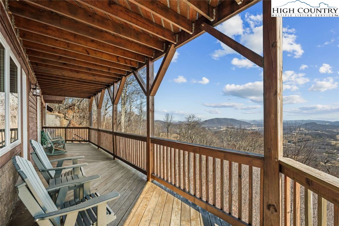 585 Stony Fork Road West Jefferson, NC 28694 - Photo 14 of 25 a view of a balcony with furniture