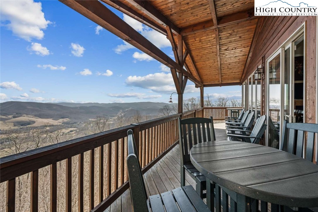 585 Stony Fork Road West Jefferson, NC 28694 - Photo 15 of 25 a view of a balcony with furniture