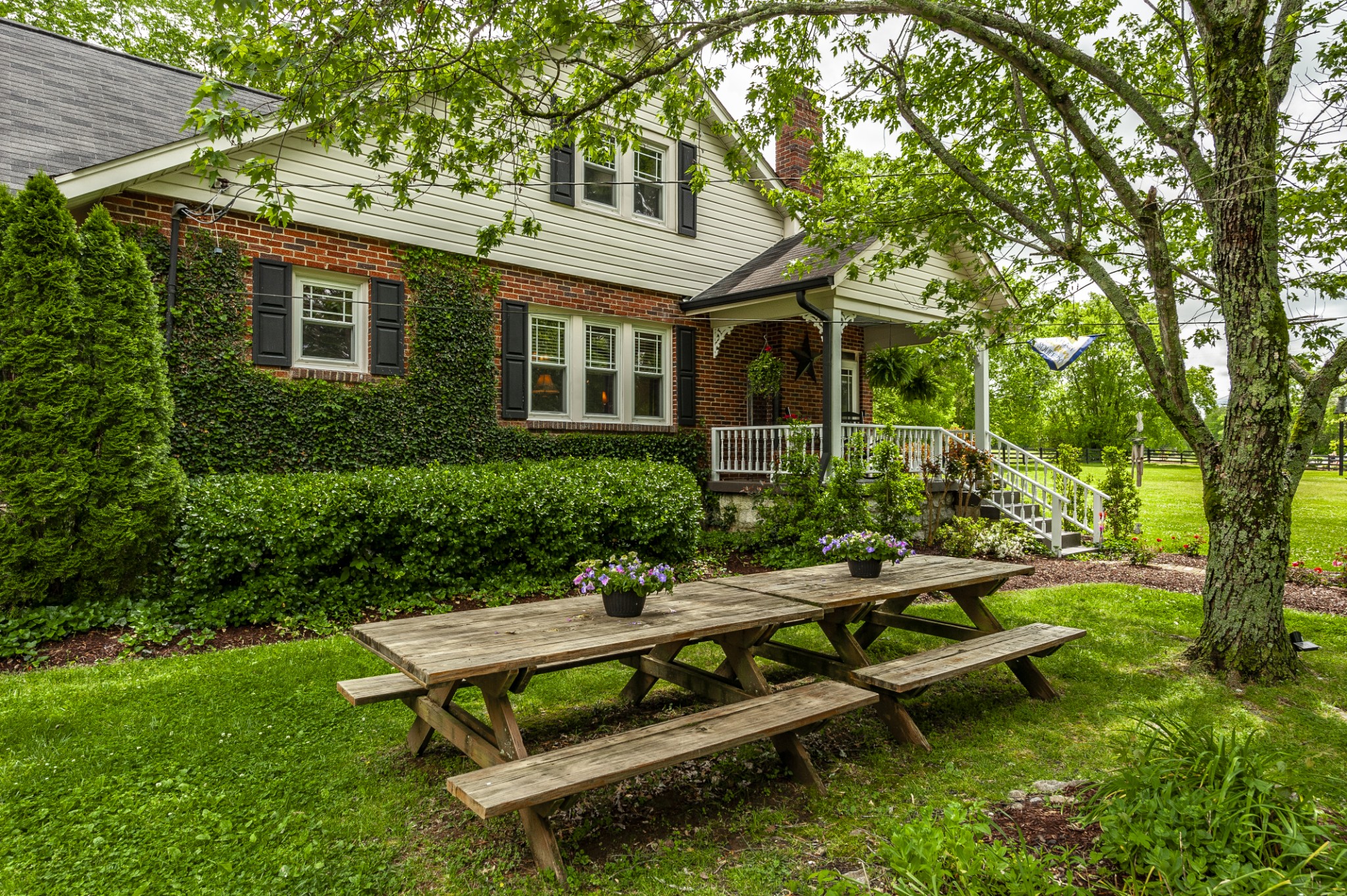 7255 Lebanon Road Lebanon, TN 37087 - Photo 20 of 55 a view of a house with backyard sitting area and garden