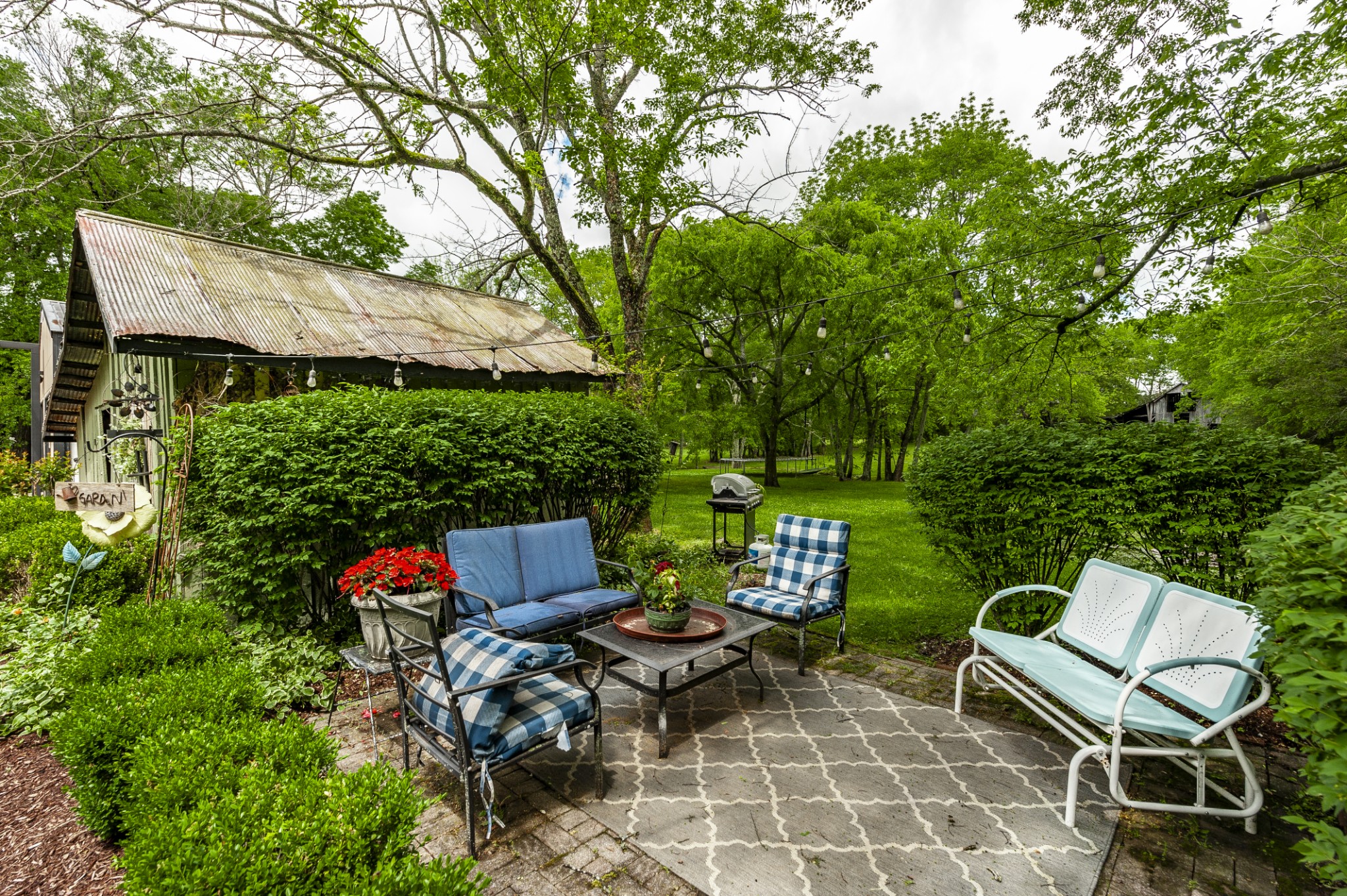 7255 Lebanon Road Lebanon, TN 37087 - Photo 21 of 55 a view of a chairs and table in backyard