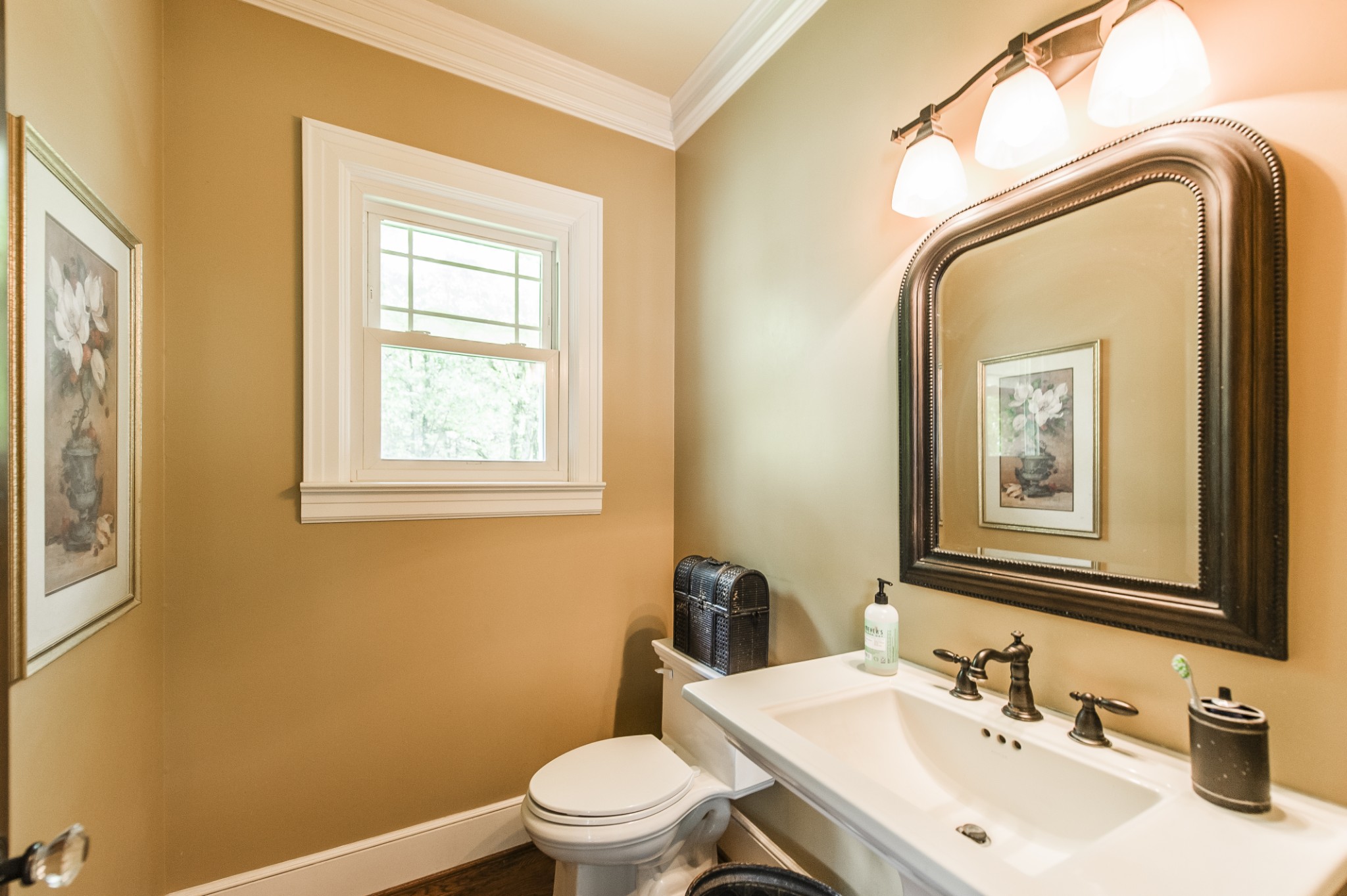 7255 Lebanon Road Lebanon, TN 37087 - Photo 33 of 55 a bathroom with a toilet sink and mirror