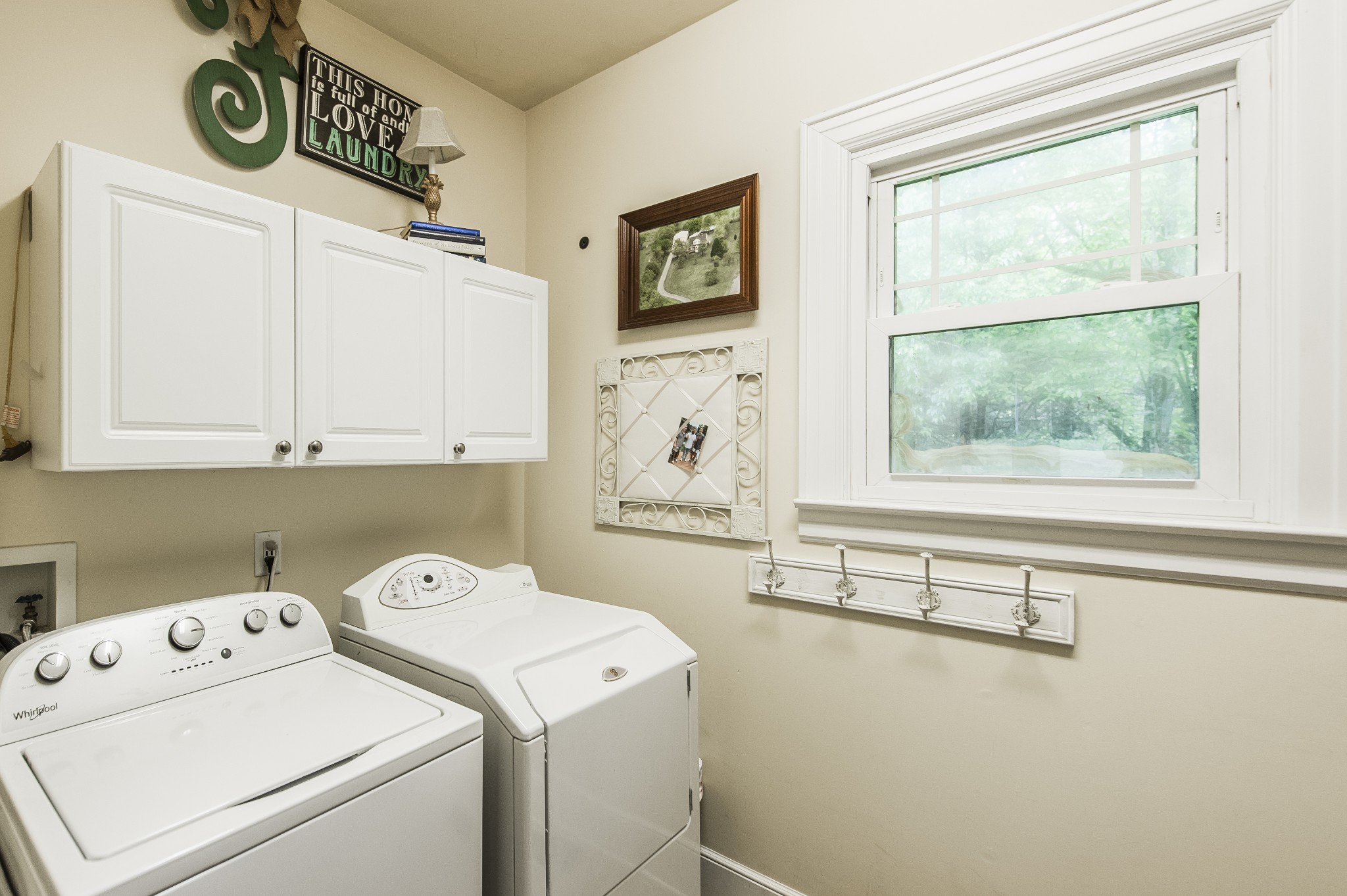 7255 Lebanon Road Lebanon, TN 37087 - Photo 34 of 55 a view of storage and utility room with a washer and dryer